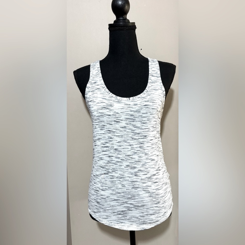 Lululemon tank with cut out back and optional back tie. No tags Measures a  4. - Picture 1 of 7